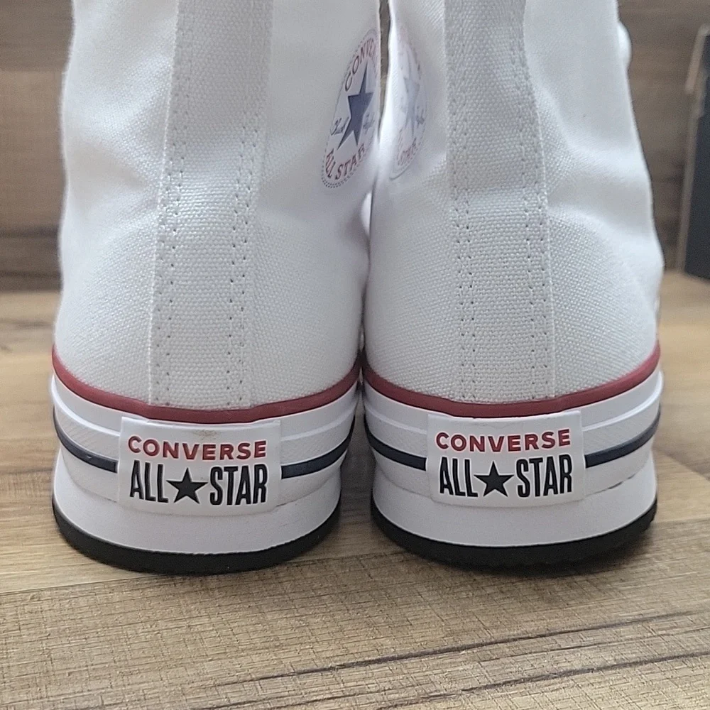 Converse White Sneakers with Blue Star Logo